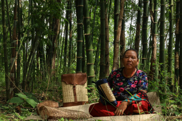 Manmaya Bhujel senior weaver with backpack design Manmaya Bhujel senior weaver with backpack design