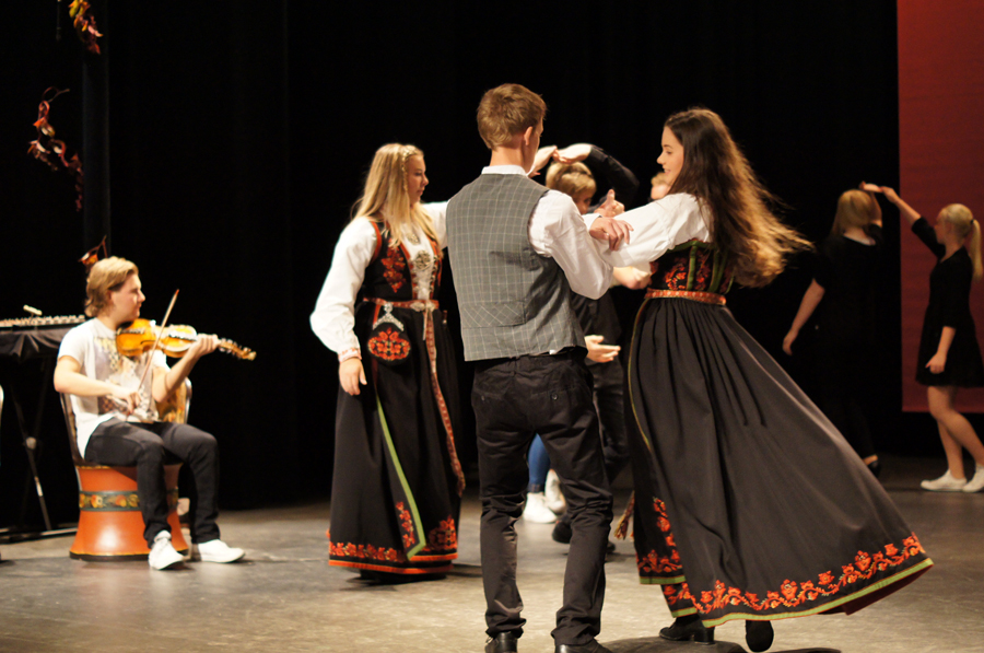 Youth playing and dancing their local traditional couple dance springer from Telemark at the opening ceremony of “Bygda Dansar” (the countryside dances) in the county Telemark in 2013